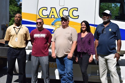 Woodle (center) had a team of people helping him through the process of getting his CDL. From left are: Quentin Morris, vocational rehab case manager at the Alabama Department of Rehabilitation Services; Justin Towry, Woodle’s partner in Central Alabama Community College’s CDL school; Liz Spiller, his interpreter working through Easter Seals Central Alabama; and Willie Brooks, CDL instructor at CACC.