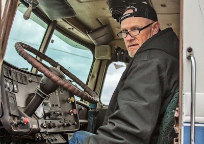 The author of this post, Don Christner, behind the wheel of Elmore’s ’74 Reo. Keep tuned to the Overdrive Extra blog here for more from Christner on each of the trucks in the Junior Elmore yard in the coming weeks.