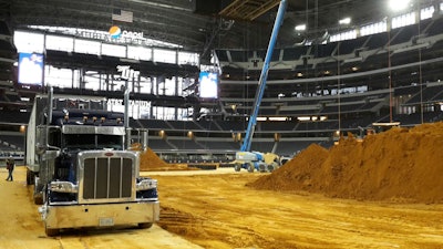 Steve Mesh delivered rodeo equipment to AT&T Stadium in Dallas. After owning a Freightliner FLD, then a Kenworth W900 that he kept for 19 years, he bought this 2014 Peterbilt in 2013.