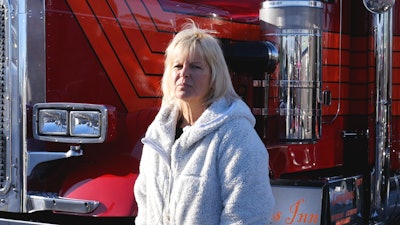 Theresa DeSantis is the original owner of this 1985 Peterbilt 359. “The Witches Inn” features witch hat cutouts in the grille, witch boot cutouts on the front bumper and a witch boots hood ornament. The color red and orange color scheme is original to the truck.