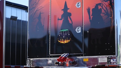 The front of her 2016 East curtainside trailer features graphics of witches at a cauldron. At MATS in March, she included Dorothy’s feet from the classic film “Wizard of Oz” to add to the theme.