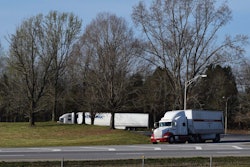 shoulder-ramp-parking-two-trucks-highway-2018-05-03-09-24