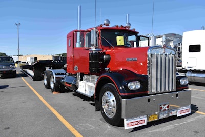 Trailer manufacturer Rampant Trailers owns this 1966 Kenworth W900A. The truck features a 400-hp Big Cam Cummins and a 13-speed. The truck is used to deliver trailers to customers.