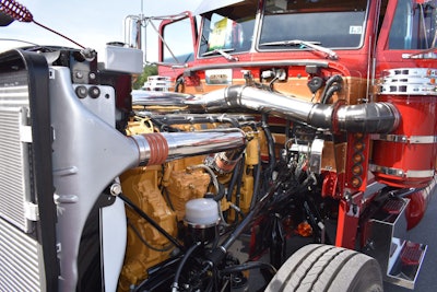 Denver Truck Painting’s 2013 Peterbilt 389 features a 6NZ Cat with an 18-speed and 3:36 rears.