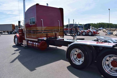 The truck sits on a factory 323-inch wheelbase. The sleeper is a 2001 70-inch custom Peterbilt Ultra.