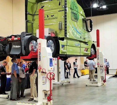 Kenn and Beth Zelten’s Volvo up on the lift for attendees of the CVSA’s recent brake-safety symposium.
