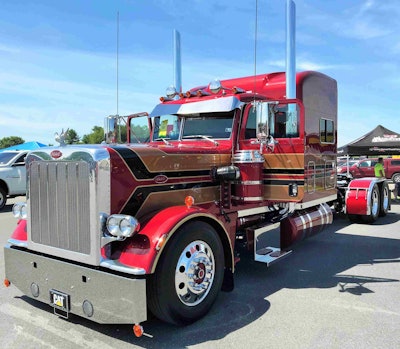 Among the rigs that had taken his attention as of this morning — he arrived on site yesterday afternoon — was this 2013 Peterbilt 389, re-engineering by the team at Denver Truck Painting (Denver, Pa.) from the ground up to look more like a 1980s 359, complete with old-school breather treatment.