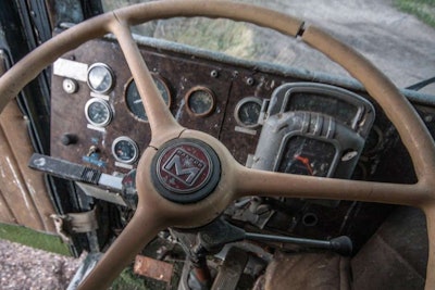 A tachograph (on the gauge panel right of the logo in the middle of the steering wheel) typically indicates the truck was formerly used in a large fleet to record the driver’s handling of engine RPMs. (I have seen a tachograph before but have never run one.) No tilt or telescope wheel here, but it was generally set about right. All trucks of yesteryear had a big steering wheel for torque to be able to turn, even trucks with power steering. The size of the steering wheel would just dominate the cab.