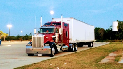 Roger Oliver's 2002 Kenworth W900L semi-truck parked