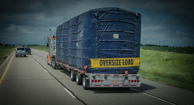 Flatbed operators continued to see their net income trend above their reefer and van counterparts in 2018’s first quarter. (Photo by Jim Allen/365 Trucking)