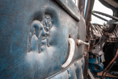 The Mack bulldog is stamped into the door panels.