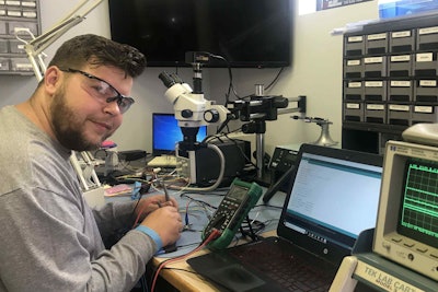 University of Tulsa mechanical engineering senior Hayden Allen works on a project aimed at making ELDs more secure.