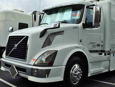 The Volvo is outfitted with a custom ARI sleeper and powered by a 500-hp Volvo D13 engine through the I-Shift automated manual transmission, with a 20,000-lb. steer axle and 40K rears. A fuller view of the reefer box follows, along with a specs list farther down.