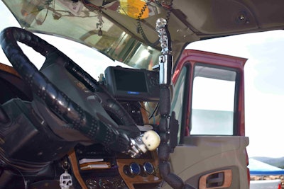 A pistol grip skull shifter and skull steering wheel spinner add to the theme of the rig.