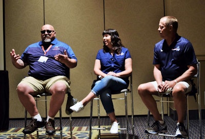 Expediter of the Year finalist and fleet owner Eric Escobar (left) with Load One-leased Tom and Tina Evans.