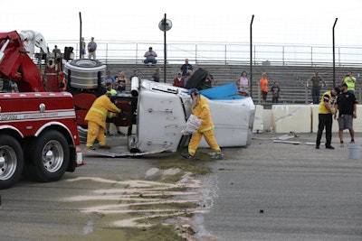 Sunday afternoon’s race at Hawkeye Downs Speedway in Cedar Rapids, Iowa, ended early after Darren Proffitt was collected in a crash that caused his truck to flip on its side. Proffitt walked away unscathed.