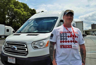 Owner-operator Tim Paxton and his 2017 Ford Transit Van at the 2018 Expedite Expo, where he was named Expediter of the Year by Expedite Now magazine.