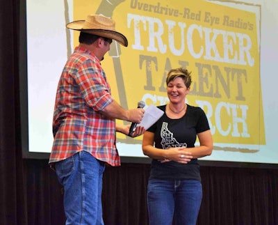 Trucker and singer-songwriter Tony Justice announces Mandi Jo Pinheiro as the winner of the 2018 Trucker Talent Search at The Great American Trucking Show in August.