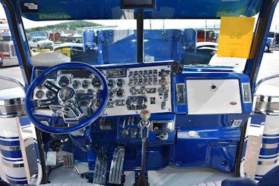 The dash, steering wheel and more are painted to match the exterior’s blue and white color scheme.
