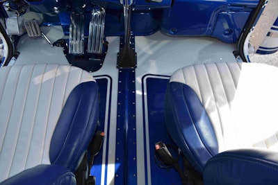 The seats are upholstered to match paint scheme, along with the aluminum floors.