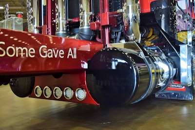 A new filler panel bewteen the tanks and stainless saddle covers above, among other elements, reflects the T-bar design ahead of the tandems.