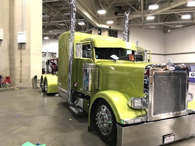 Laird “Spike” Fuller hauls reefer freight nationwide with this 1995 Peterbilt 379. He says the unique color, which he calls lime gold, was custom mixed in his friend’s backyard.