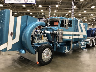 This 1987 Peterbilt 359 sports a 425-hp Cat 3406B with a 10-speed main/4-speed auxiliary. It is owned by Aric Hendricks out of Floydada, Texas.