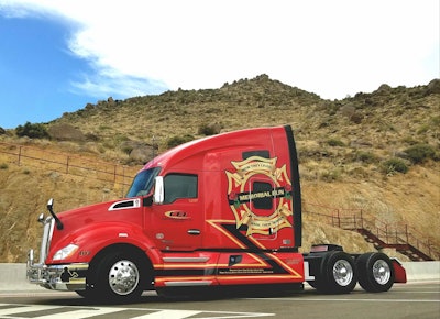 Memorial Run is pictured here with the site of one of the deadliest wildland fire disasters in American history in the background, Yarnell Hill in Arizona. Among events the Rogers have attended with the truck since it was put into service April 1 was the June opening of the Granite Mountain Interagency Hotshot Crew Learning and Tribute Center in nearby Prescott, Ariz. This photo adorns a poster Randy Rogers is quick to give to anyone along the road he interacts with about the truck and the history of firefighting.