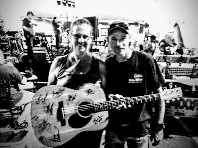 Holly and Mark O’Donnell, who later filled their guitar with the autographs of nearly every artist who performed at the event.