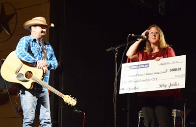 Sutherland Springs, Texas, First Baptist Church member Sherri Pomeroy accepted a $5,000 donation to the church, where her husband serves as pastor.