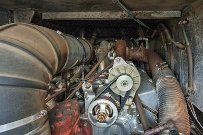 The two-cycle V8 Detroit Diesel, seen here in Junior Elmore’s old 1975 Diamond Reo, was a very different kind of motor than what is on the road today. It had to be kept wound tight in order to get anything out of it. It was kept above 1,900 RPMs — shift early, shift now, shift often! This truck has a gauge for exhaust temperature called a pyrometer. Normal exhaust temperature on your pyrometer was 900-1100 degrees. If the motor was pulled too hard for too long, by keeping your foot in it at too low of an RPM range while putting a lot of air and fuel in the motor, that would turn it into a blow torch and burn holes in the pistons. Especially if it was turned up. There was no computer to manage all this — the driver had to pay attention to the pyrometer.