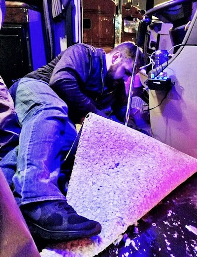 Owner-operator Bobby Laws, working on an operator customer’s 2015 Freightliner Coronado floor at the Mid-America Trucking Show this past year.