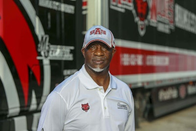 Johnny Harris, a driver for MC Express, hauls the Arkansas State University football team’s equipment on weekends in the fall. He gets access to the team’s locker room, among other perks, for hauling the gear.