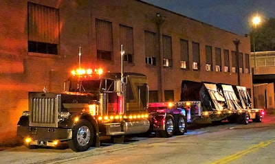 He located it by way of a friend who’d seen the rig over time parked in Maine, where it’d been used in a logging operation. Toward the end of its time there the friend also noted it had newly acquired a for-sale sign in the window. Prifti, ultimately, picked it up in March of 2012 and later put it into service. It’s pictured here after he’d picked up a step deck earlier this year and started running with his authority as High Standard Transportation, in June.
