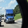 truck-on-highway-in-rear-view-2018-09-19-13-49