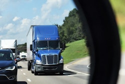 truck-on-highway-in-rear-view-2018-09-19-13-49