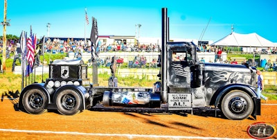 A profile-view look at Chuck Timbrook’s BlackOut veterans-support rig.