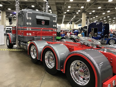 Hammett’s 389 was originally solid gray with a red frame, but he repainted it with red striping and rebuilt the rear end. The fender brackets, hose hangers and rear T-bar were all built by the Hammetts.