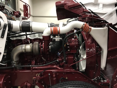 The engine, a 3406B Cat with an 18-speed is all painted to keep up with the rest of the truck’s color scheme.