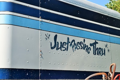 Around the time Bates’ acquired the Freightliner, his father had bought an old needle-nose KW that came with a “box of old memorabilia,” he says. Just a week before the show in Joplin, his father found this just-perfect license-plate frame among that memorabilia: