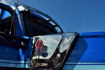 Stainless pieces on either side of the hood nod to the traditional breathers on the W900 models, and feed an under-hood intake system more akin to that in aerodynamic trucks in Kenworth’s stable of truck models.