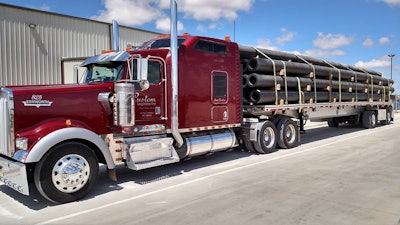 Independent Robert Codding hauls with this 2001 Kenworth W900 and spread-axle 48-foot flatbed. When his wife needed to back out of handling most of the freight contracting and the books for his one-truck operation, he moved to dispatch provider Merge Transit to book loads on the spot market. “I have seen a 15 percent increase in top-line revenue,” he says. “That more than offsets what I pay for the service.”