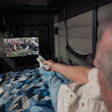Trucker watching EpicVue satellite tv in his truck's cabin