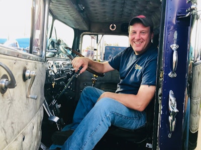 Jason Keeler of Jersey Shore, Pa., with his 1950 needle-nose Kenworth. Spec’d with a KTA 600, 2:90 rears and a twin stick 13 and 4, “at 70 mph, she’s got four more gears to go,” said Keeler.
