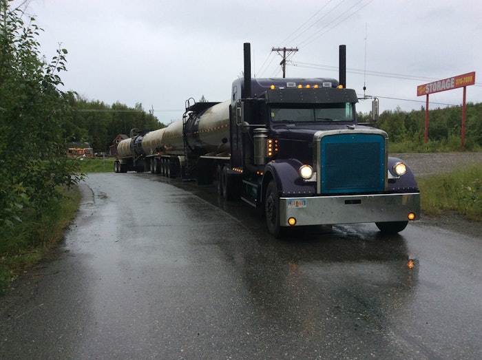 Hot and Heavy Uploaded by : Bobby Reid Statewide hotshot Transport Hauling hot oil in the rain, at 3am in Wasilla, Alaska.