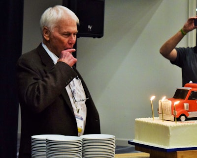 NASTC’s Owen and the entire hall presented Baker (pictured) this birthday cake and a rousing rendition of what Owen called the “underwater birthday” song — the classic birthday song sung while moving an index finger up and down in front of your teeth, as demonstrated here by Baker.