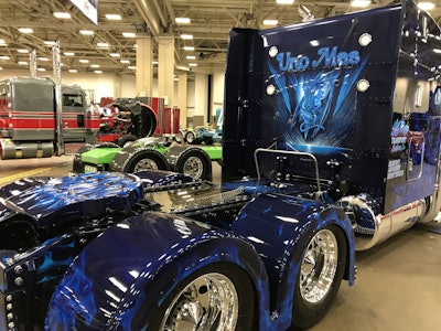 The back of the cab features more dragon graphics, and the rear fenders have flames in the shape of dragon heads.