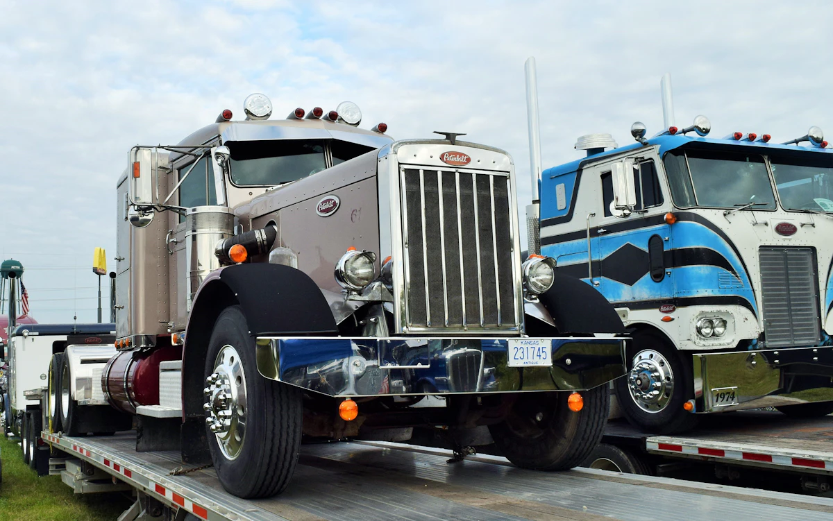 The '61 needlenose and '74 cabover Petes — and a pair of 389