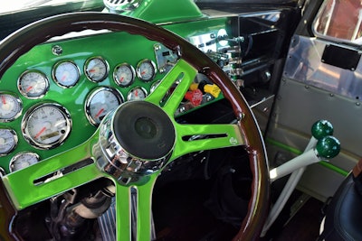 The custom Corvette-style dash Snelson built with a steel base, as is the case for much of his metal custom parts, though cab extenders on the unit were built from aluminum to save hanging weight:
