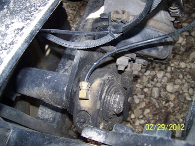 He connected quarter-inch plastic hose to each fitting, running the other ends to the grease targets, with UV-resistant plastic ties keeping the hoses secure. The hoses run to components shown here that typically require getting under the truck to apply grease.